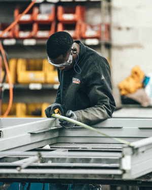 A man engaged in a manufacturing process.
